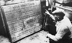 Plaque originally mounted above Nent Force portal 