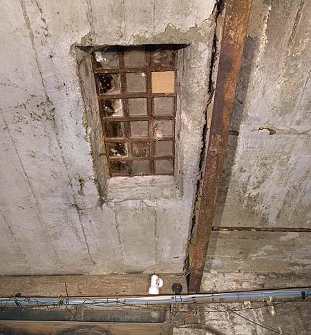 Light was provided by 'pavement lights' in the ceiling, these are all now covered over (Nick Catford)