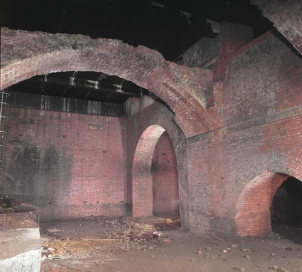 Brick arches on the canal bed under the Great Northern Warehouse. Note the access ladder on the left (Nick Catford)
