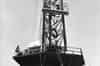 Painting skip on one of the 820' masts (Rugby Radio Museum)