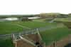 Looking north across the parade ground from the roof of the barrack block. The spiral staircase to the main magazine and caponiers can be seen on the left with the secondary senior officers' mess on the right (Nick Catford)