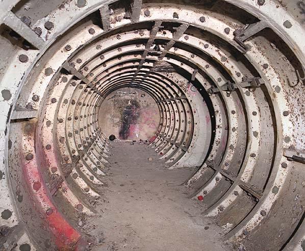 The east end of the main access tunnel through the bunker. The emergency exit is to the right (Nick Catford)