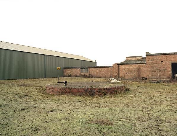 The top of the emergency water supply tank. The bonding building is to the left linked by a covered way to the charging building on the right (Nick Catford)