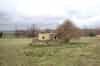 One of nine Type 24 pillboxes on or around the site; this one is in a field north of the main transmitter block. The pillbox was strengthened at a later date with a skirt of concrete filled sandbags faced with brick (Nick Catford)