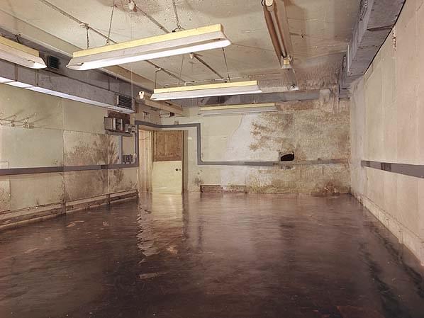 Cabinet room before the water was pumped out. Note the message hatch into the teleprinter room in the far wall (Nick Catford)