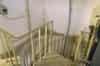 The top of the southern spiral staircase, looking down into the sub-basement (Nick Catford)