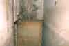 The blast door at the bottom of the main eastern stairs from the basement to the sub-basement (Nick Catford)