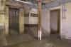 On the lower floor of the shelter on room (left) remains unaltered retaining its original tiling. The door to the right is the corridor along the full length of the shelter (Nick Catford)