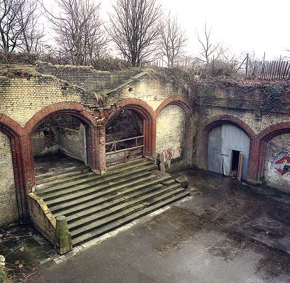 The steps up to the main floor of the Palace in January 1987. There are more steps through ther arch (Nick Catford)