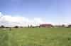 Pylons Farm House stands on the site of the transmitter block which was demolished in December 1997. Note the guy anchor block on the left, its purpose is unknown as the transmitter towers weren't guyed (Nick Catford)