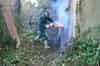 Cutting a panel out of the door to gain access to the tunnels (Nick Catford)