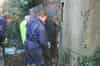 After repairing the door a new steel panel is positioned over the door for added future security (Nick Catford)