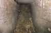 Backfilled main entrance to No. 1 gun magazine. Note the electrical fittings on the wall (Nick Catford)