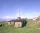 The R11 technical block. The WW2 CHL technical block can be seen to the rear with the Type 14 radar plinth to its right. The building on the far right now houses BT microwave equipment. The same building is exclusive to R11 Rotor stations. At RAF Snaefell it was used as a standby set-house (Nick Catford)