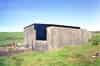 The standby set-house close to Kilchiaran Farm house with the base for the fuel tanks alongside (Nick Catford)