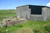 The standby set-house in Kilchiaran village with the base for the fuel tanks to the left (Nick Catford)