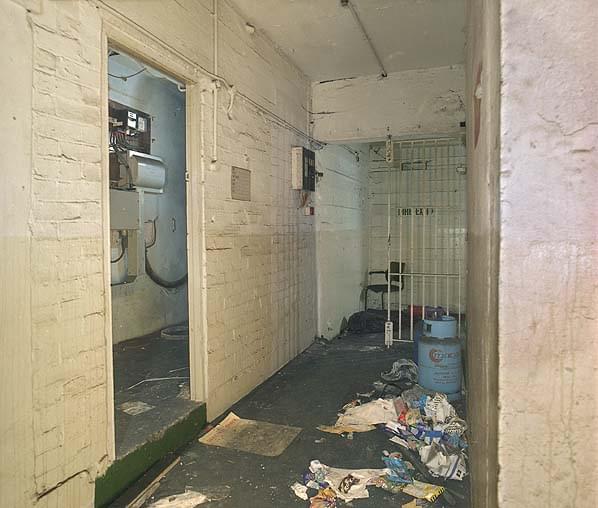 Inside the main entrance, the room on the left is a switch and cable intake room although only designated as a store when the bunker was reused as a civil defence control (Nick Catford)