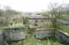 The abandoned WW2 command post. The height finder was mounted in the open area to the foreground with the predictor in the open area to the rear. The covered room on the right to the rear is the plotting room with steps down into the plotting room in the centre (Nick Catford)