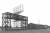 Sopley Intermediate Transportable GCI with AMES Type 8C radar. The upper aerial on the gantry was to increase low level coverage. The operations room and the transmitter receiver are housed in the hut behind