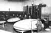 Sopley GCI Final - the reporting room. The large map is the general situation map., the middle map is the fighter plotting map and the left map is the reporting table. The fighter tote is on the rear wall. On the dais to the left are two WAAF's operating the height finding station