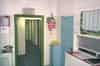 Inside the guardhouse - the personnel side of the access control office. Through the door turn right to the head of the stairwell to the bunker. There are toilets along the corridor on the right (Sub Brit Collection)