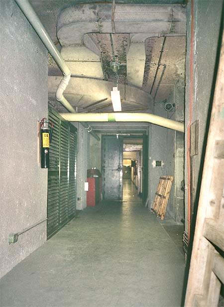 Looking back along the upper spine corridor. The gas filtration plant is to the left and the cooling plant to the right. The gas doors in the centre isolated the bunker for the plant and machinery areas (Sub Brit Collection)