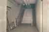 Stairs to emergency exit, the sewage ejectors are through the doorway to the right (Sub Brit Collection)