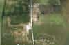 Recent aerial view of the technical site. The R3 guardhouse can be seen to the left of the road and the crop marks to the right of the road indicate the position of the happidrome. Other crop marks indicate old roads and buildings