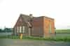 The guardhouse from the rear before restoration. The stair block house the plant entrance and the top of the stairwell (Nick Catford)