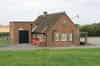 The rear of the guardhouse - square block houses the plant entrance and the top of the stairwell (Nick Catford)