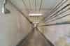 The tunnel leading from the bottom of the guardhouse stairwell to the R3 bunker (Nick Catford)