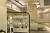 The upper level in the AC plant room - electrical switchgear in the foreground with the Baudelot heat exchanger behind (Nick Catford)