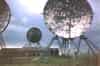 The four parabolic dish antennas with the operations block between them shortly after closure of the station (Graham Eckersall)