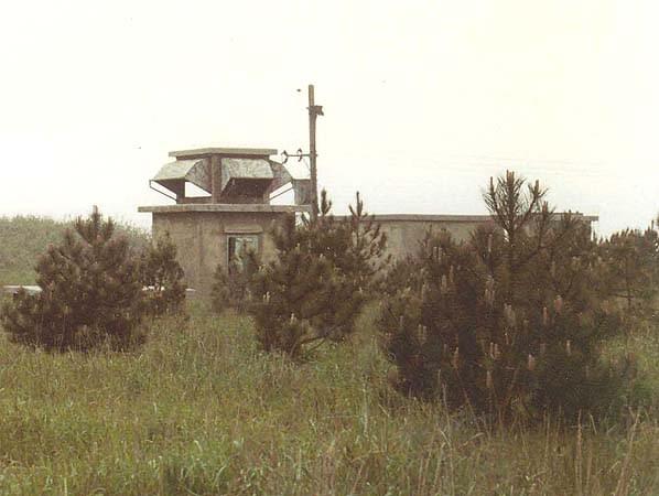 The emergency exit from the R1 bunker and ventilation intake shaft in the mid 1980's shortly after the site had been repurchased by the MOD. The rear entrance opens onto the top of the stairwell and was used for bringing plant into the bunker 