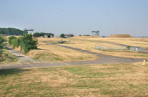 Looking west from the revetment around the arming shed. The missile pads are in the middle distance with the radar towers and standby generator building to the rear and the station headquarters in the background (Nick Catford)