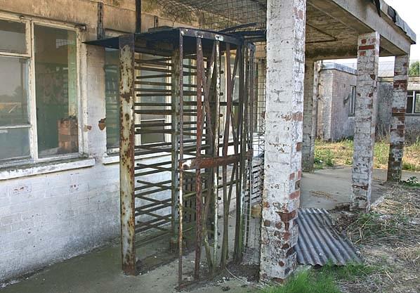 The guardhouse with its turnstile at the entrance to the site (Nick Catford)