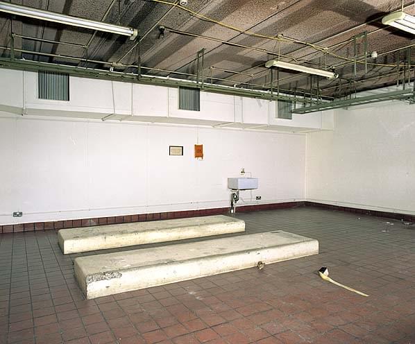 GPO power room. Racks of lead acid batteries stood on the plinths. Note the tiled floor and sink in case of an acid spill (Nick Catford)