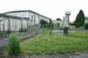 The R8 operations block from the rear. The raised radar office is at the rear with a ramp and platform for bringing heavy plant and equipment into the building. The air conditioning plant room (now demolished) was to the right of the platform. The lower building to the left housed additional radar equipment. The standby set house is on the right with the Met Office radar behind (Nick Catford)