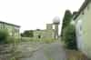 The standby set house with the Met Office radar behind. The building on the right is the high voltage switch house (Nick Catford)
