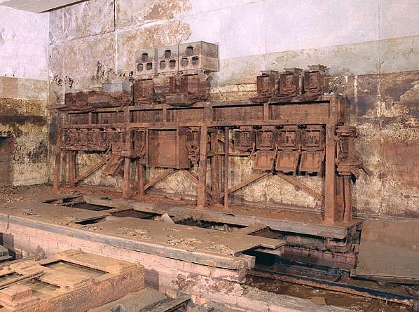 Switchgear at the back of the radar machine room. Note the engine bed in the foreground for one of the motor-alternators (Nick Catford)