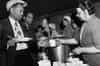 Lining up in the canteen tent on Clapham Common in July 1948. The Women's Voluntary Service provided refreshments in the tent on Clapham Common close to the shelter entrance