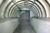Short tunnel linking the toilets with the main access tunnel from the lift landing at the south end of the shelter (Nick Catford)
