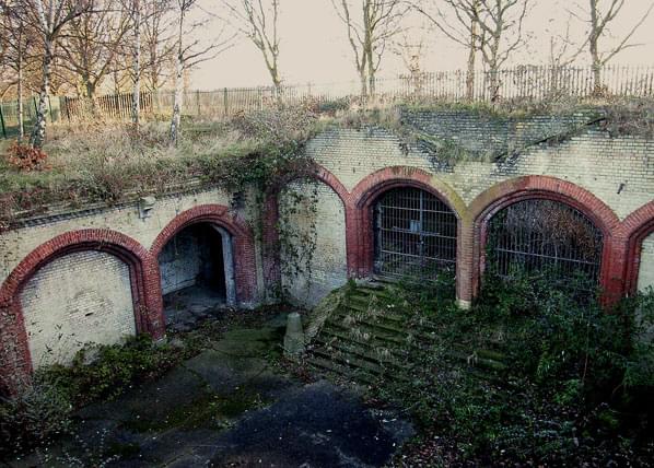 The concourse area that would have been covered by a twin roof, the edge of which can still be discerned in the far wall (Chris Fletcher)