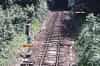 The view towards Grove Junction and Tunbridge Wells a few days before the end, in July 1985. Note the severe speed restrictions - as shown on the blue warning boards - and the poor condition of the trackbed, with very little ballast showing through all the mud. This line has been, quite literally, driven into the ground