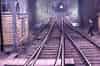 The mid-1970s and a driver's eye view of the signalman at Tunbridge Wells West B box, about to hand over the single line token for the short section to Grove Junction through the tunnel (John Wenham)