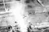 The reactor seen from a helicopter on 3rd May 1986 with a column of ionized air or perhaps smoke from the graphite fire