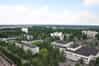 Pripyat - view from the roof of one of the the 16 storey apartment blocks. The central square is on the right with the Polissya Hotel far right and the Cultural Palace to its left (Nick Catford)