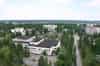 Pripyat - view from the roof of one of the the 16 storey apartment blocks. The central square is in the centre with the Polissya Hotel to the rear and the Cultural Palace to its left (Nick Catford)