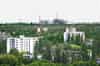 Pripyat - view from the roof of one of the the 16 storey apartment blocks showing the close proximity of the power station to the town (Nick Catford)