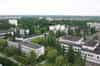 Pripyat - view from the roof of one of the the 16 storey apartment blocks, the central square can be seen far right (Nick Catford)